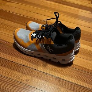 On Cloud Orange and Black Sneakers